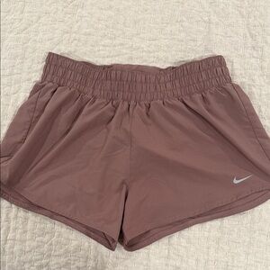 Nike Women's Dri Fit Shorts in Mauve